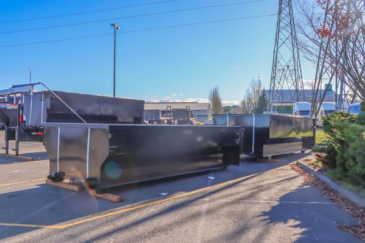 Roll-off dumpster ready for waste disposal at job site for 3 Yard Dumpster Rental in Macomb
